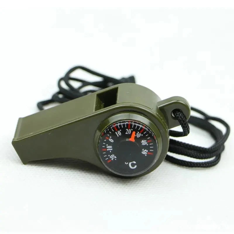 Green survival whistle attached to bug out bag