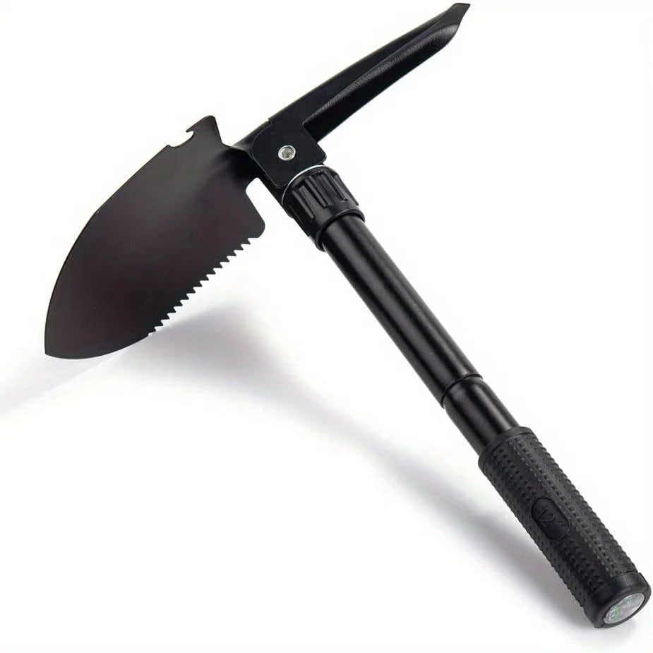 Black folding survival shovel fully extended on white background