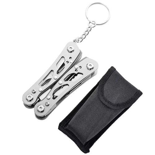 Silver multitool keychain with black pouch on a white background