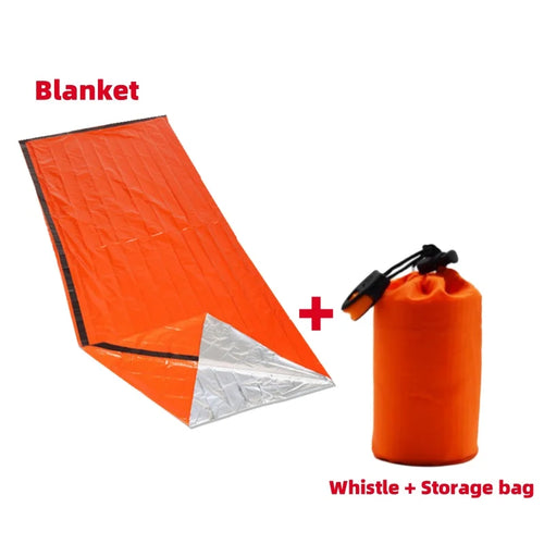 Orange emergency blanket with silver mylar and a whistle + storage bag on a white background